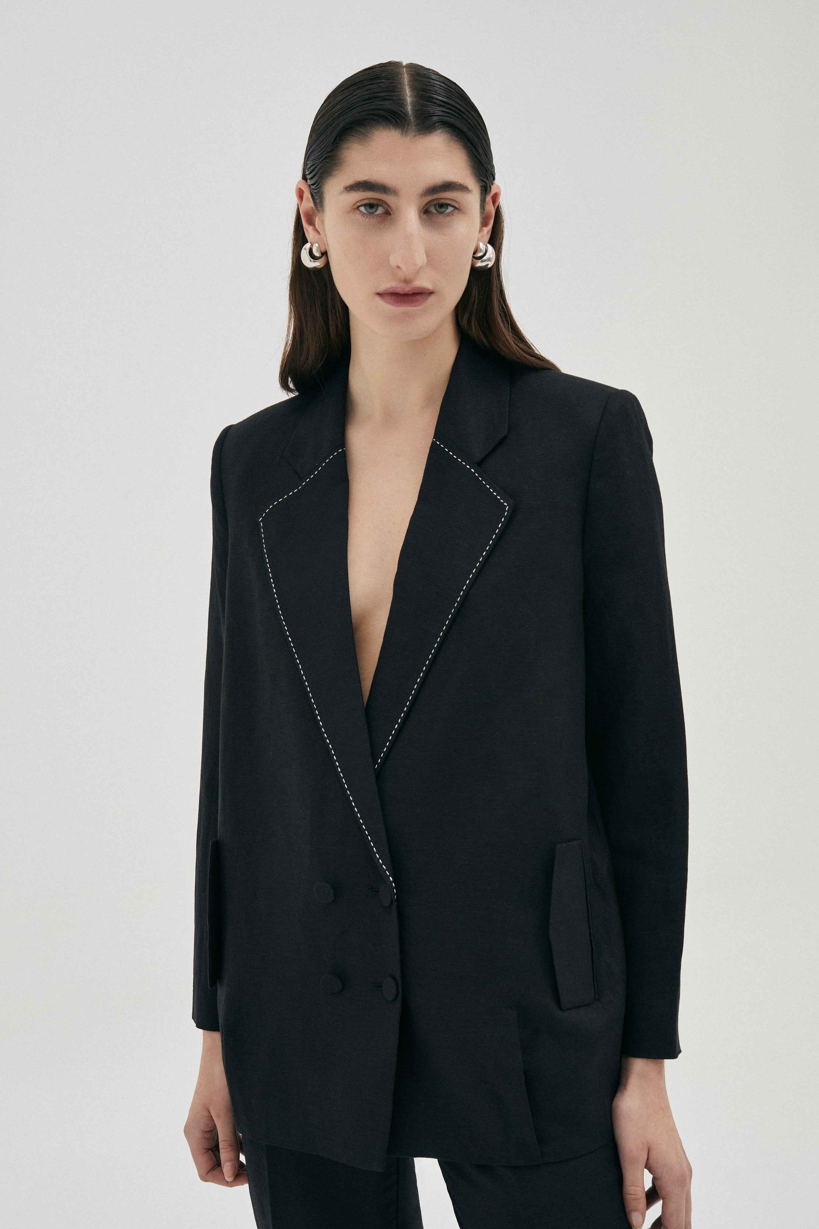 Amara double breasted blazer in Linen | Cotton from Australian designer PALMA MARTÎN.  Features a heavy decorative stitch on collar lapels in white contrast.