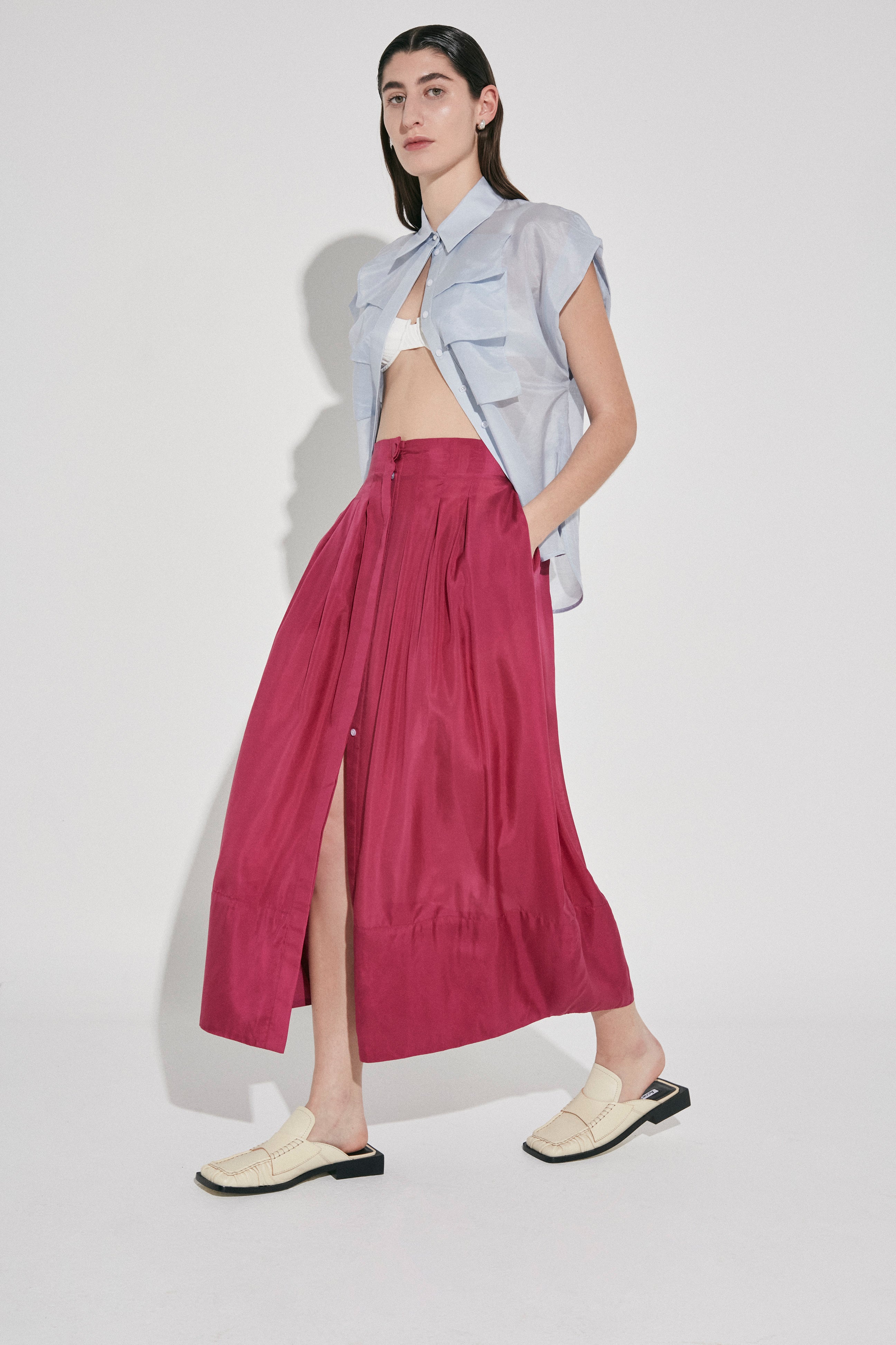 Ablaze pleated maxi skirt by Australian Designer PALMA MARTÎN.  A statement piece in Fuchsia coloured Silk. 