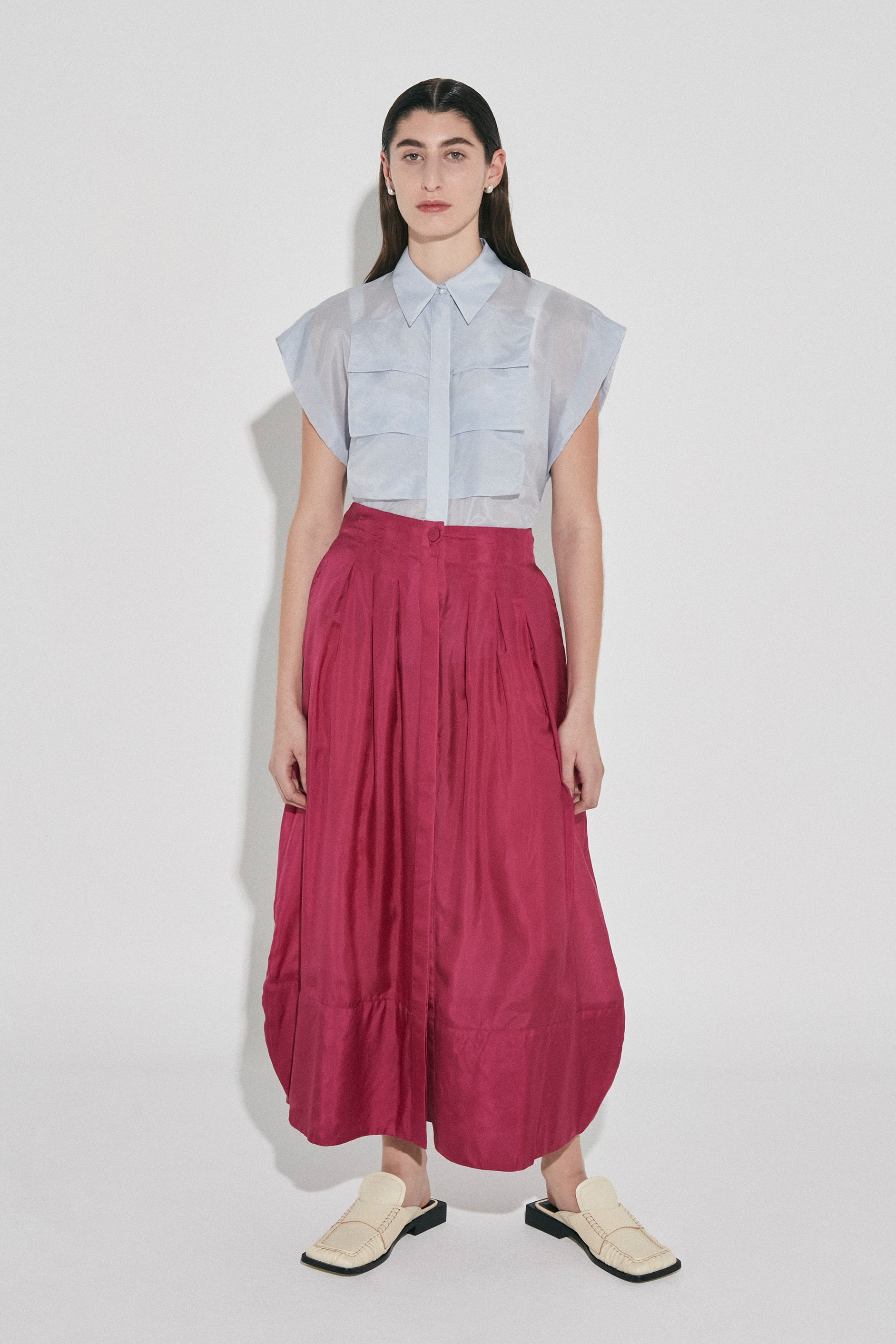 Ablaze pleated maxi skirt by Australian Designer PALMA MARTÎN.  A statement piece in Fuchsia coloured Silk. 